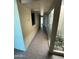 Hallway with tile flooring and access to patio at 2835 N 49Th St, Phoenix, AZ 85008