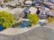 Single-story home with a curved driveway and mature landscaping at 29711 N Yellow Bee Dr, San Tan Valley, AZ 85143