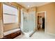 Bathroom with walk-in shower and large closet at 29711 N Yellow Bee Dr, San Tan Valley, AZ 85143