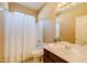 Bathroom with shower/tub combo and vanity at 29711 N Yellow Bee Dr, San Tan Valley, AZ 85143