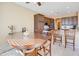 Bright dining area with wood table and seating for four at 29711 N Yellow Bee Dr, San Tan Valley, AZ 85143