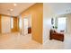 Bright and spacious entryway with tile flooring, leading to other rooms at 29711 N Yellow Bee Dr, San Tan Valley, AZ 85143