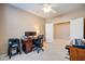 Home office with large desk and double monitors at 29711 N Yellow Bee Dr, San Tan Valley, AZ 85143