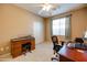 Home office with desk and built-in shelving at 29711 N Yellow Bee Dr, San Tan Valley, AZ 85143