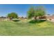 Landscaped park area with grassy lawns at 29711 N Yellow Bee Dr, San Tan Valley, AZ 85143