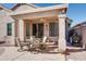 Covered patio with seating area and ceiling fan at 29711 N Yellow Bee Dr, San Tan Valley, AZ 85143