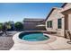 Inviting kidney shaped pool in backyard oasis at 29711 N Yellow Bee Dr, San Tan Valley, AZ 85143