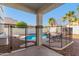 Inviting backyard oasis with a sparkling pool and patio furniture at 29808 N Yellow Bee Dr, San Tan Valley, AZ 85143