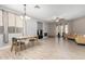 Bright dining area with wood table and chairs at 30061 N 70Th Dr, Peoria, AZ 85383