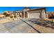 Two-story house with attached garage and landscaping at 30061 N 70Th Dr, Peoria, AZ 85383