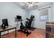 Bright home gym with exercise equipment and workspace at 30061 N 70Th Dr, Peoria, AZ 85383