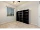 Home office featuring built-in bookshelves and large window at 30061 N 70Th Dr, Peoria, AZ 85383