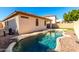 Inviting kidney-shaped pool with a waterfall feature at 30061 N 70Th Dr, Peoria, AZ 85383