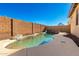 Stunning kidney shaped pool with a waterfall feature at 30061 N 70Th Dr, Peoria, AZ 85383