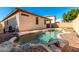 Relaxing kidney-shaped pool with waterfall feature at 30061 N 70Th Dr, Peoria, AZ 85383