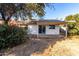 Home's back and side yard view at 3009 W Potter Dr, Phoenix, AZ 85027