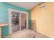 Kitchen with light wood cabinets and sliding glass door at 3009 W Potter Dr, Phoenix, AZ 85027