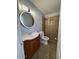 Updated bathroom with a vanity, toilet, and shower/tub combo at 3028 W Bloomfield Rd, Phoenix, AZ 85029