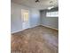 Bright dining room with tile floors and access to exterior at 3028 W Bloomfield Rd, Phoenix, AZ 85029