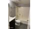 Clean bathroom with a tub/shower combo and dark vanity at 3031 N Civic Center Plz # 130, Scottsdale, AZ 85251