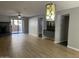 Open living area with wood-look floors and access to patio at 3031 N Civic Center Plz # 130, Scottsdale, AZ 85251