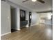 Spacious living room with wood-look floors and fireplace at 3031 N Civic Center Plz # 130, Scottsdale, AZ 85251