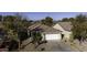 House with a tile roof and a white garage door, seen from above at 40112 W Catherine Dr, Maricopa, AZ 85138