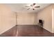 Bright living room featuring hardwood floors and a ceiling fan at 4321 W Greenway Rd, Glendale, AZ 85306