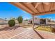 Covered patio with flagstone floor and view of detached garage at 4321 W Greenway Rd, Glendale, AZ 85306