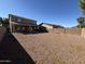 Large backyard with gravel and block wall at 44152 W Pioneer Rd, Maricopa, AZ 85139