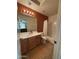 Clean bathroom with a tub, shower, and updated vanity at 44152 W Pioneer Rd, Maricopa, AZ 85139