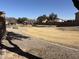 Sunny community park with playground and grassy area at 44152 W Pioneer Rd, Maricopa, AZ 85139