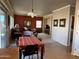 Dining area with table and chairs, offering a view of the living room at 44152 W Pioneer Rd, Maricopa, AZ 85139