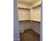 Large walk-in closet with double hanging rods at 44152 W Pioneer Rd, Maricopa, AZ 85139