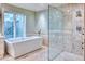 Spa-like bathroom with soaking tub and walk-in shower at 4529 E Clearwater Pkwy, Paradise Valley, AZ 85253