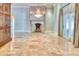 Formal dining room with fireplace and hardwood floors at 4529 E Clearwater Pkwy, Paradise Valley, AZ 85253