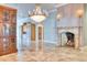 Elegant dining room with fireplace and built-in cabinetry at 4529 E Clearwater Pkwy, Paradise Valley, AZ 85253