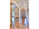 Grand entryway with hardwood floors and arched wooden door at 4529 E Clearwater Pkwy, Paradise Valley, AZ 85253