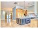 Gourmet kitchen with island, custom cabinetry, and high-end appliances at 4529 E Clearwater Pkwy, Paradise Valley, AZ 85253