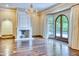 Spacious living room with hardwood floors and French doors at 4529 E Clearwater Pkwy, Paradise Valley, AZ 85253