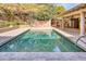 Inviting rectangular pool with large patio and covered area at 4529 E Clearwater Pkwy, Paradise Valley, AZ 85253