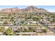 Stunning aerial view showcasing the home and mountain views at 4591 E Calle Ventura --, Phoenix, AZ 85018