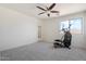 Bright bedroom with plenty of space for a home gym at 46108 W Tulip Ln, Maricopa, AZ 85139