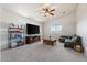 Bright bonus room with large windows and ample space for lounging at 46108 W Tulip Ln, Maricopa, AZ 85139