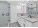 Modern bathroom with double vanity, stylish tile, and glass shower at 4642 N 31St St, Phoenix, AZ 85016