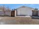 Detached garage with white door and concrete pad at 4642 N 31St St, Phoenix, AZ 85016