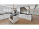 Modern kitchen with island, white cabinets, and black countertops at 4642 N 31St St, Phoenix, AZ 85016