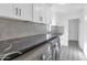 Laundry room with modern washer and dryer, and ample counter space at 4642 N 31St St, Phoenix, AZ 85016