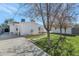 Side yard with concrete pathway and mature trees at 4642 N 31St St, Phoenix, AZ 85016