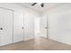 Bright bedroom with tile floors and double closets at 5031 W Flynn Ln, Glendale, AZ 85301